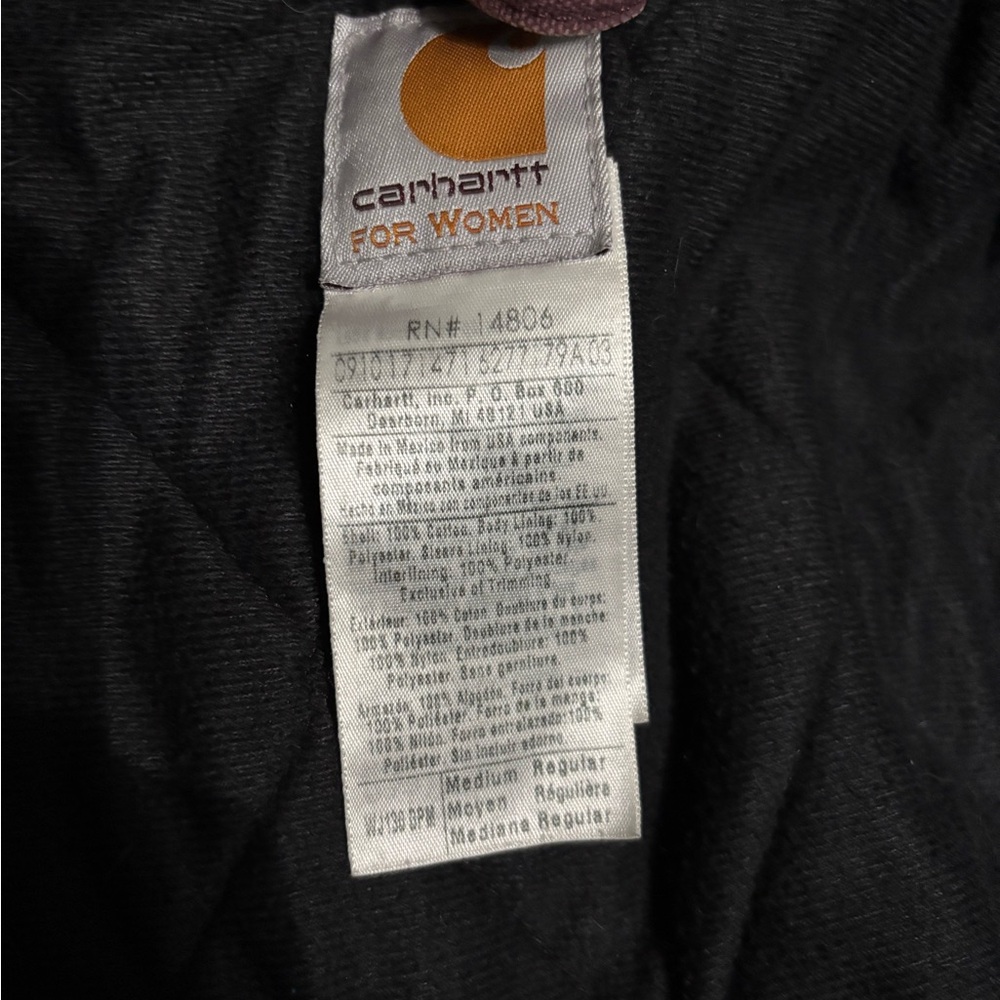 Worn purple women’s Carhartt jacket